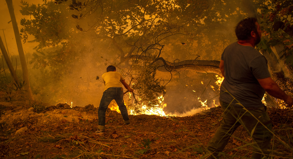 Mayor optimistic inferno can be held back from Greek island hub