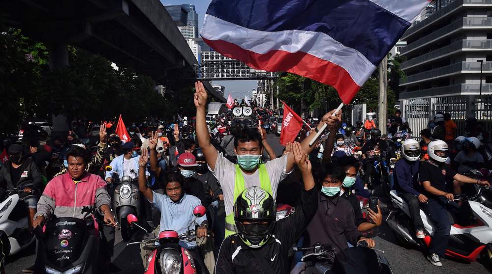 Thai police defend use of force against protesters angered by COVID management
