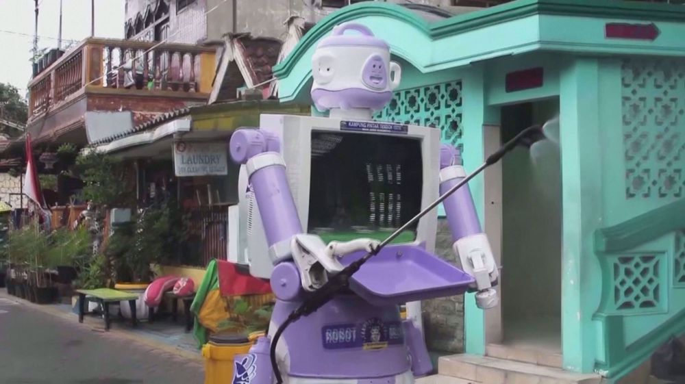 Robot delivers food, 'get well soon' messages to Indonesians in isolation