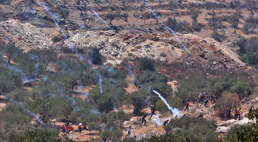 Israeli forces attack anti-settlement Palestinian protesters in West Bank
