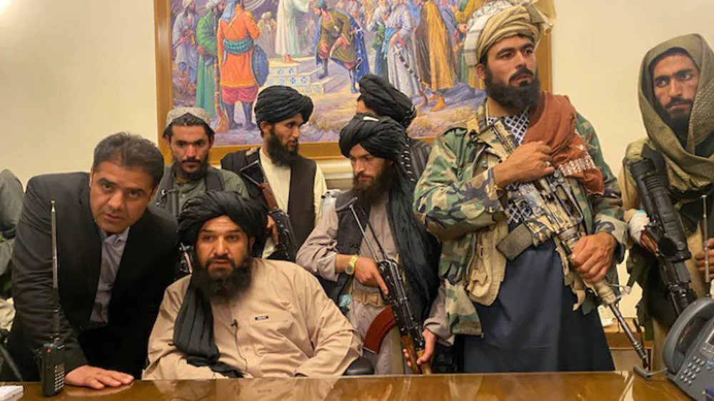 With Ghani out of picture, Taliban waltz into Kabul presidential palace