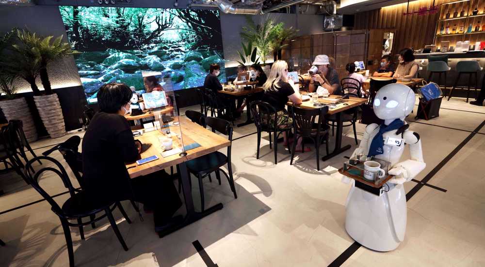 Tokyo robot cafe offers news spin on disability inclusion