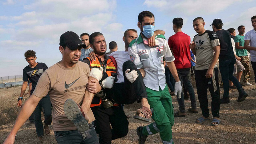 Israel fires live ammo on Palestinian protesters in Gaza, wounding 24