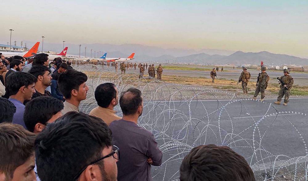 ‘US troops at Kabul airport extort money from Afghans seeking evacuation’