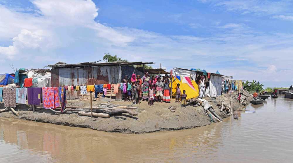 Floods threaten hundred of thousands in northeast India
