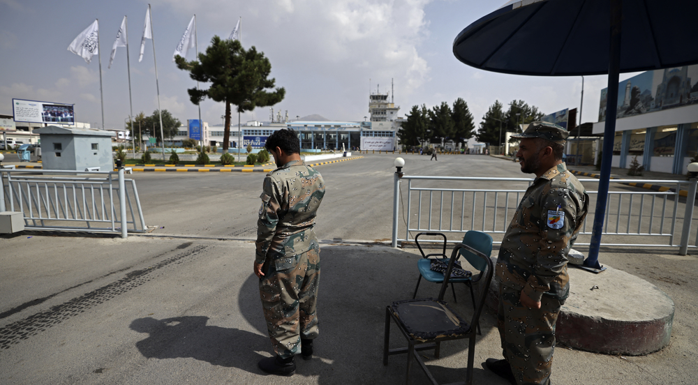Afghan police return to work alongside Taliban at Kabul airport