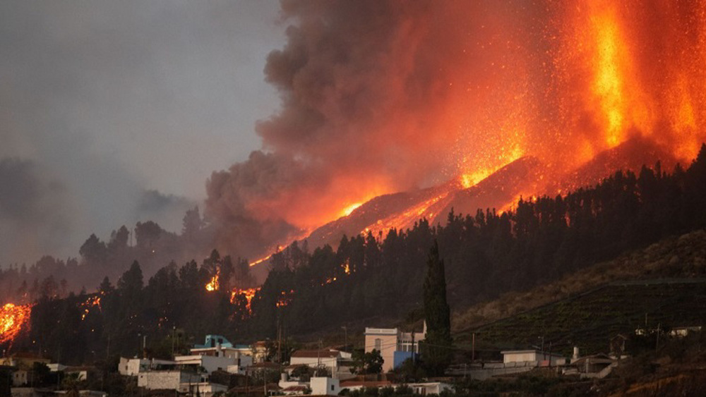 Lava flows destroy houses in Spain's Canary Islands