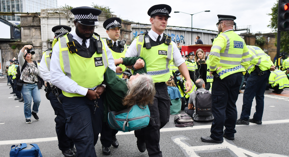 UK police say four officers hurt in clash with anti-vaxxers