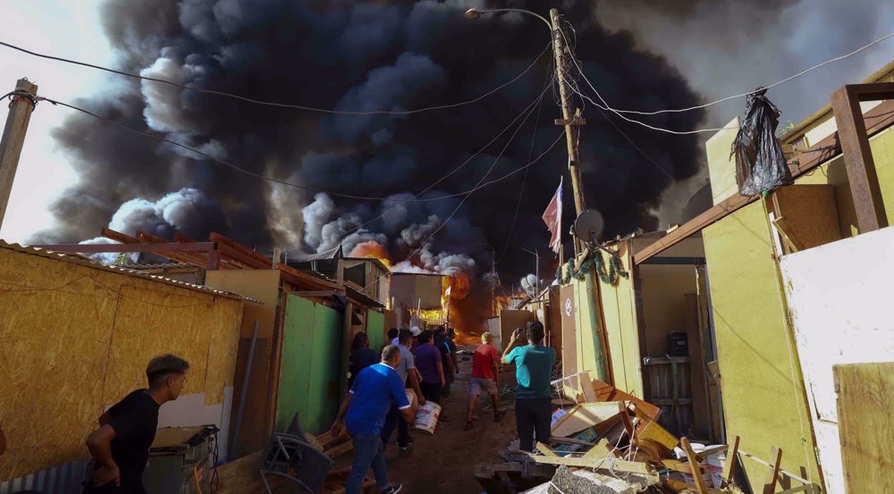 Hundreds left homeless as fire engulfs over 100 houses in Chile