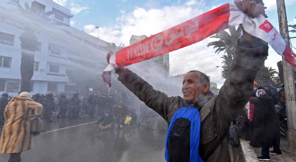 Tunisians stage protest against president on 2011 uprising anniversary