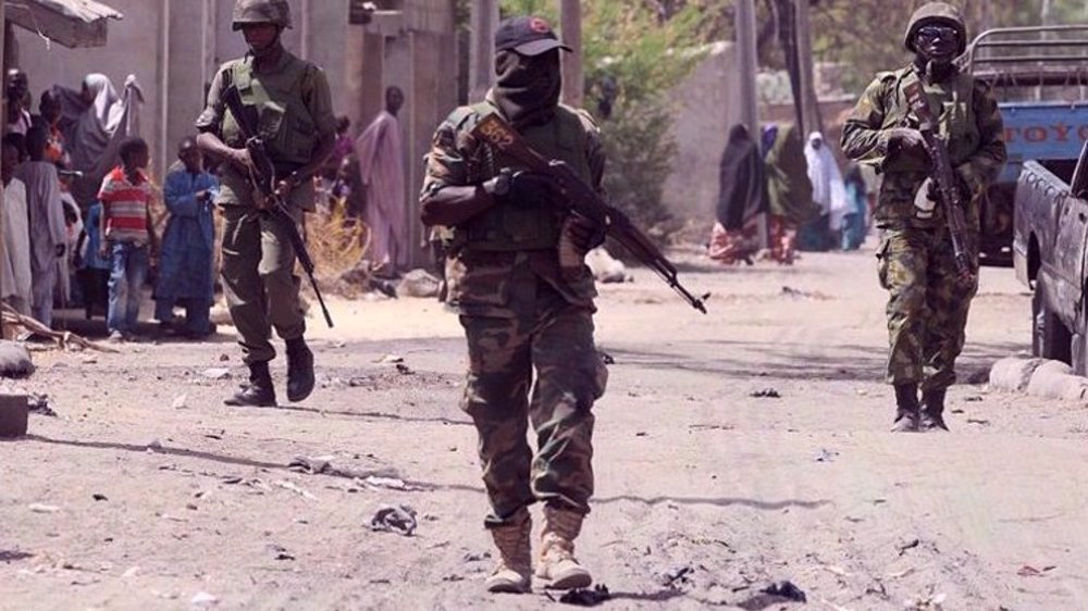 Gunmen raid village in Nigeria's northwest, kill at least 50