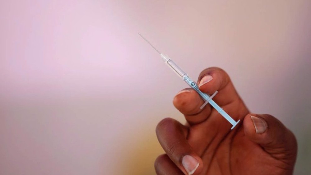 Florida suspends health official who urged staff to get vaccinated