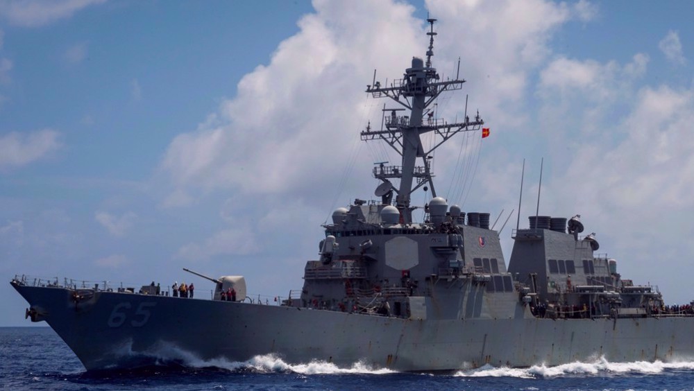 China warns away US warship in South China Sea