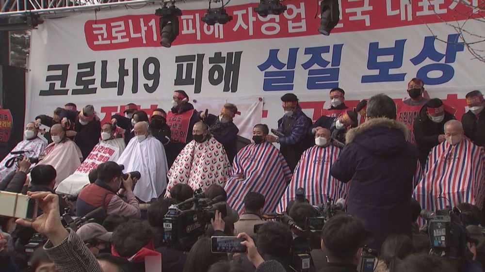South Korean business owners shave heads to protest COVID-19 curfews