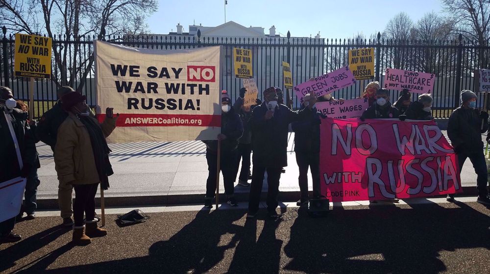 ‘Stop antagonizing Moscow’: Anti-war activists rally outside White House