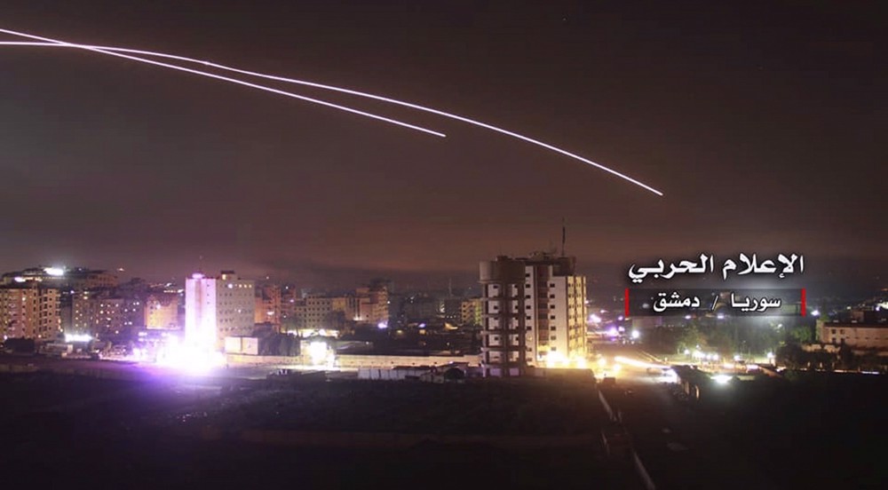 Syrian air defenses intercept Israeli missile barrage targeting Damascus