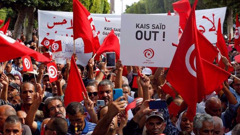 Tunisia's rival opposition groups rally against president