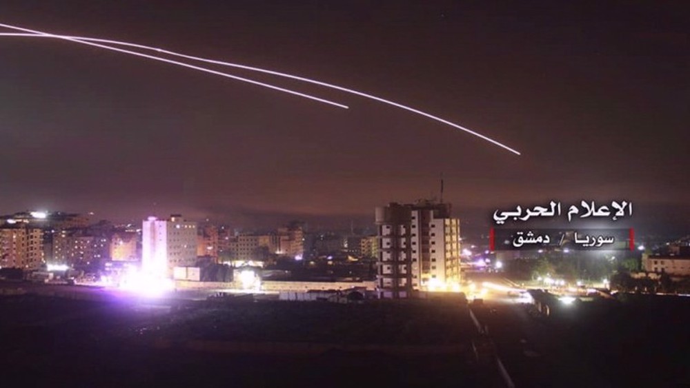 Syrian air defenses intercept, confront Israeli missile barrage targeting Damascus suburbs