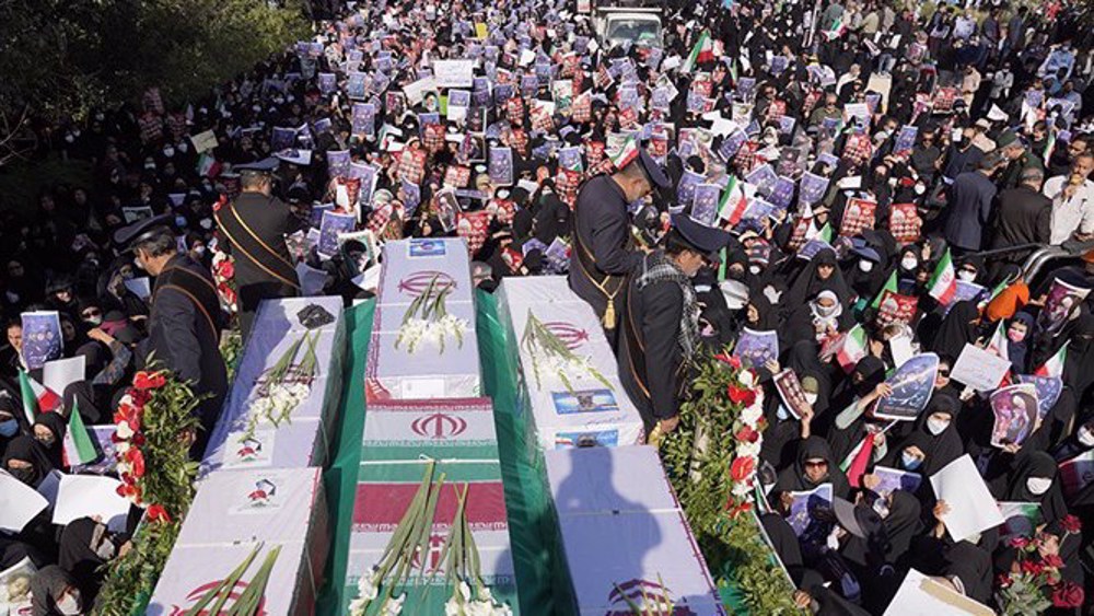 Iranians attend huge funeral for victims of terror attack in Shiraz