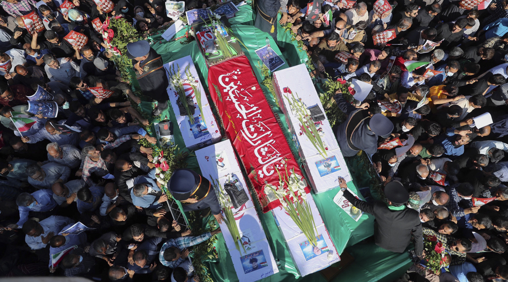 Mass funeral held in Shiraz for victims of terror attack 