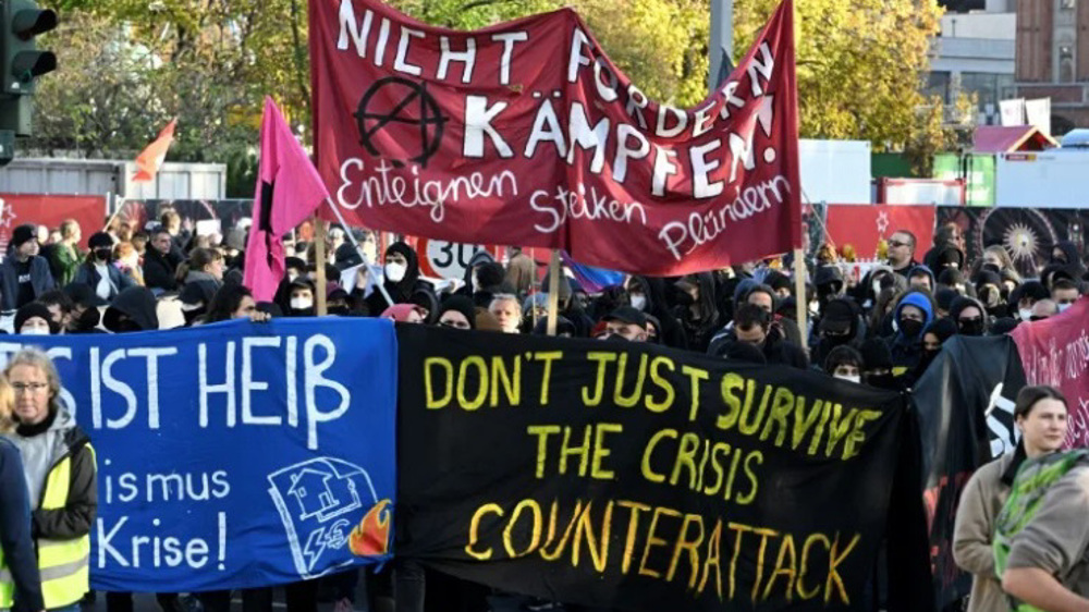 German demonstrators hold massive rally in Berlin in protest at hiking ...