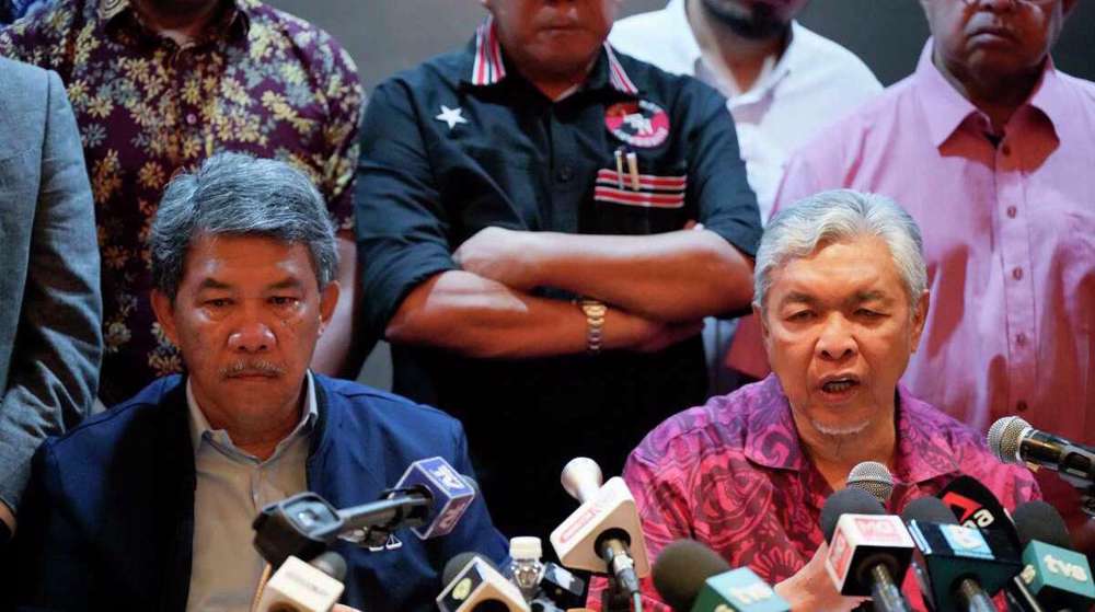 Rival parties in Malaysia race to form new government amid looming deadline