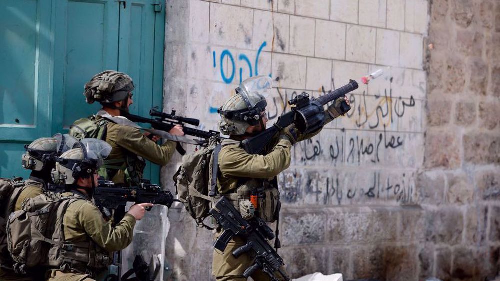Israeli forces arrest dozens of Palestinians during raids in West Bank, al-Quds