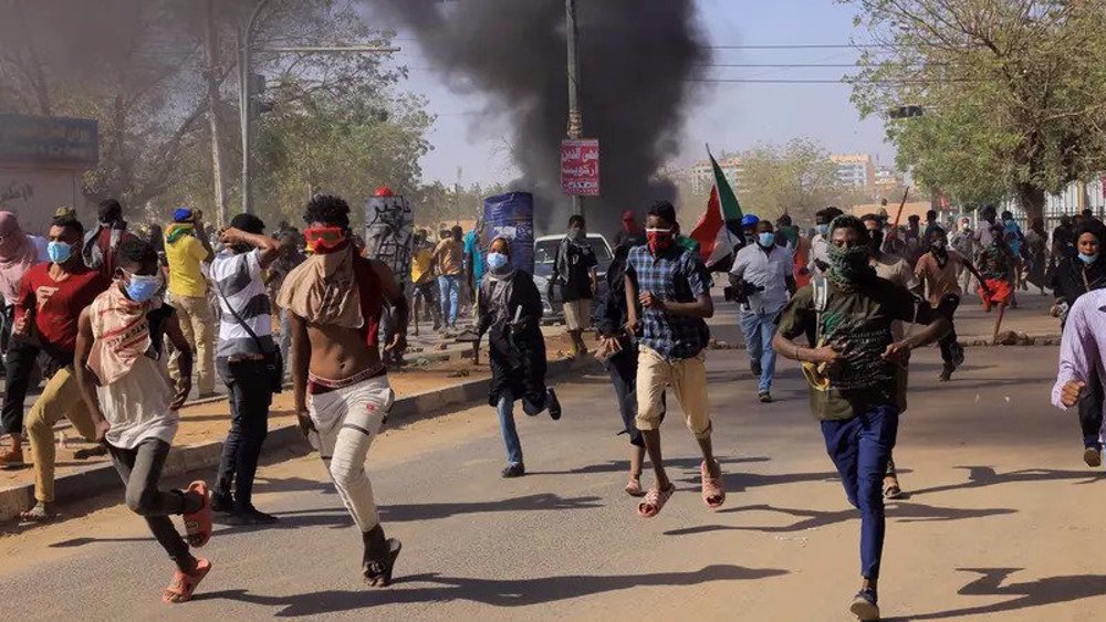 Sudan’s forces use tear gas, stun grenades to disperse rally against post-coup deal
