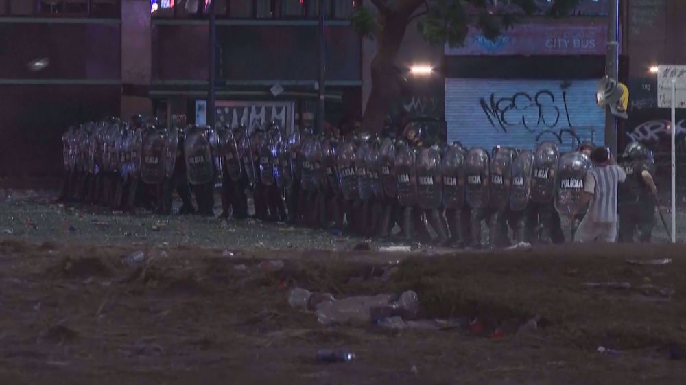 Argentina fans clash with riot police in Buenos Aires