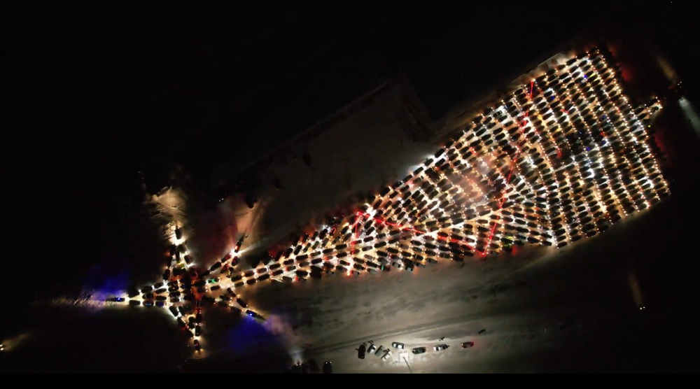 Russian drivers line up their cars forming huge Christmas tree shape