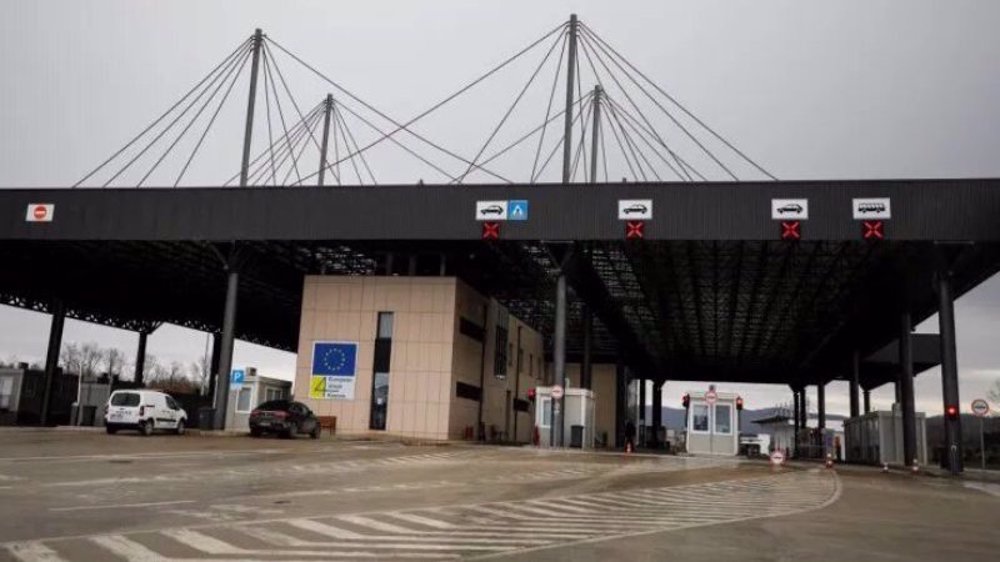 Serbs remove border roadblocks as Kosovo standoff eases