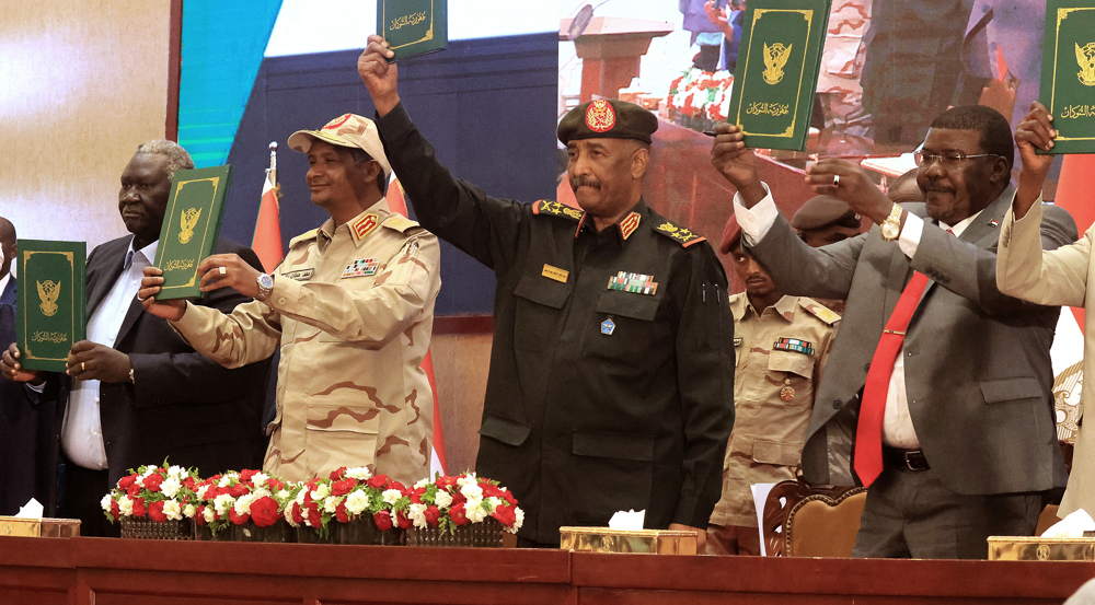 Sudan generals sign deal with civilian parties as protests go on