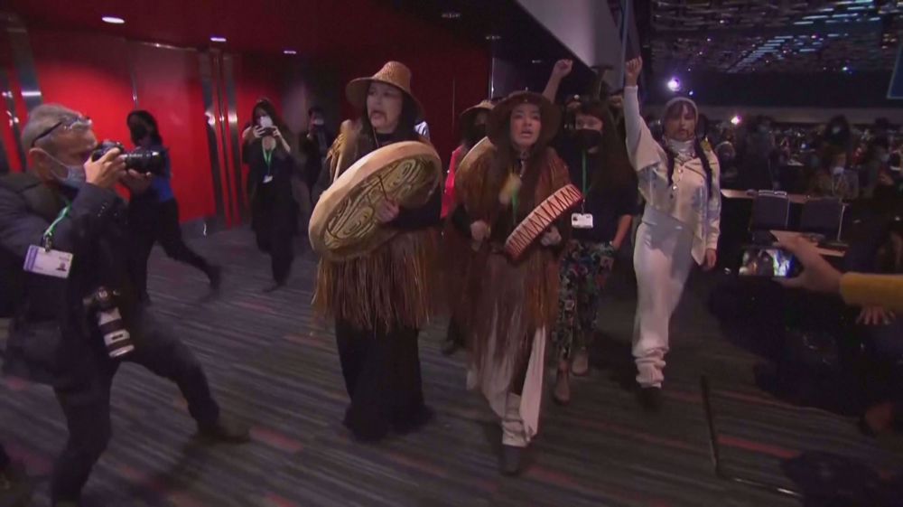 ‘Stop invading our lands’: Indigenous protesters interrupt Trudeau's COP15 speech 
