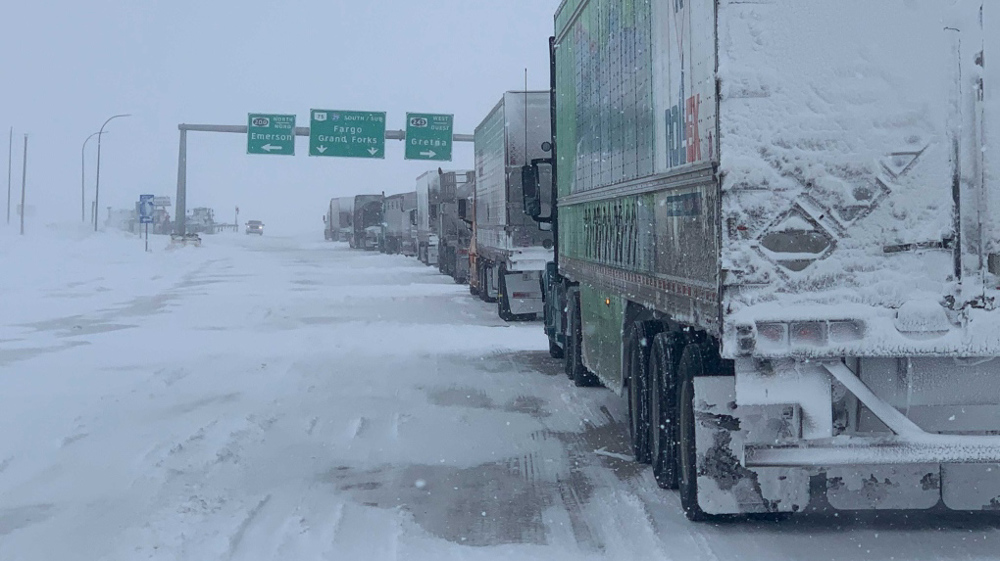 Canada truckers block key border crossing with US over anti-COVID measures