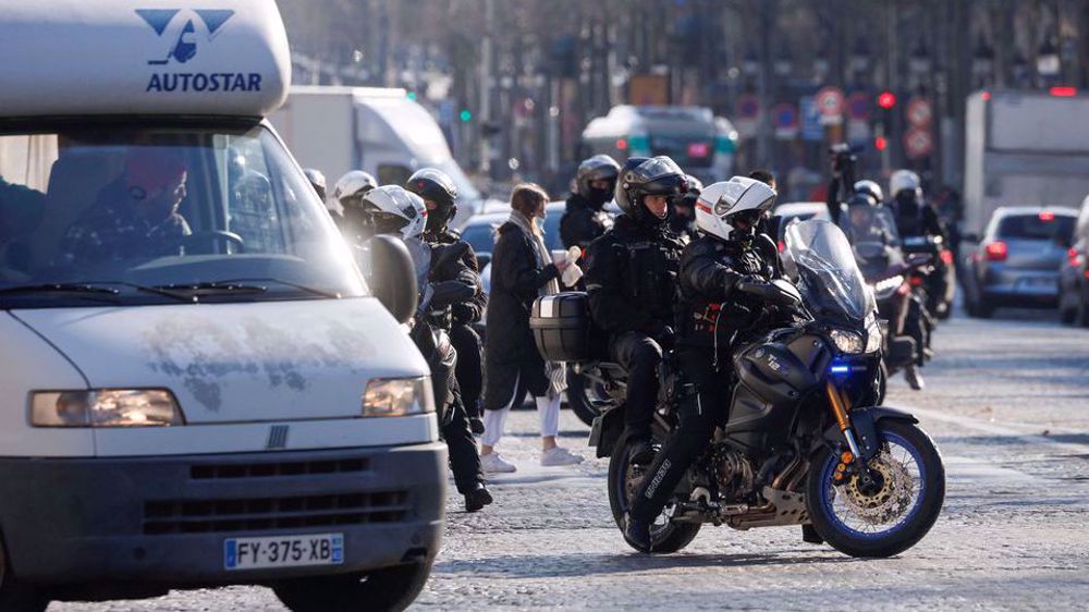Police fire tear gas as anti-restrictions 'Freedom Convoy' enters Paris