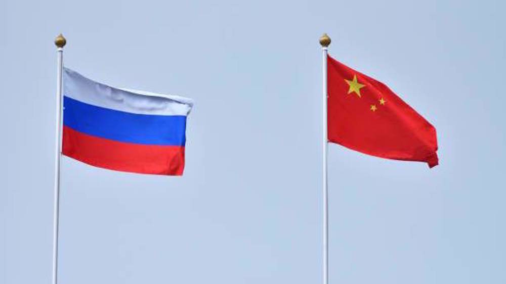 China decries Russia sanctions as 'illegal'; urges parties to show restraint