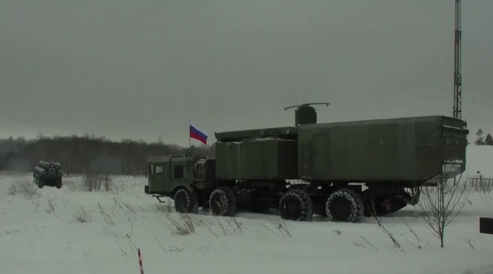 Russian army shows missile launchers exercise and flies over Belarus