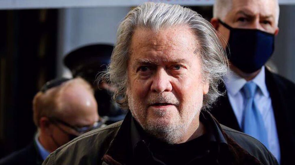 Judge orders Justice Dept. to hand over certain internal legal records to ex-Trump adviser Bannon