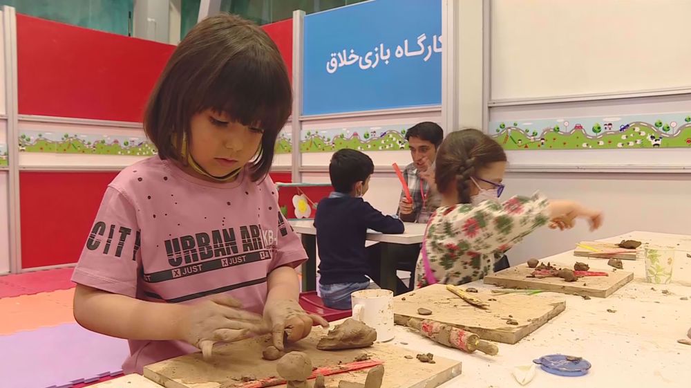 Iran's biggest toy show attracts families on Ramadan nights
