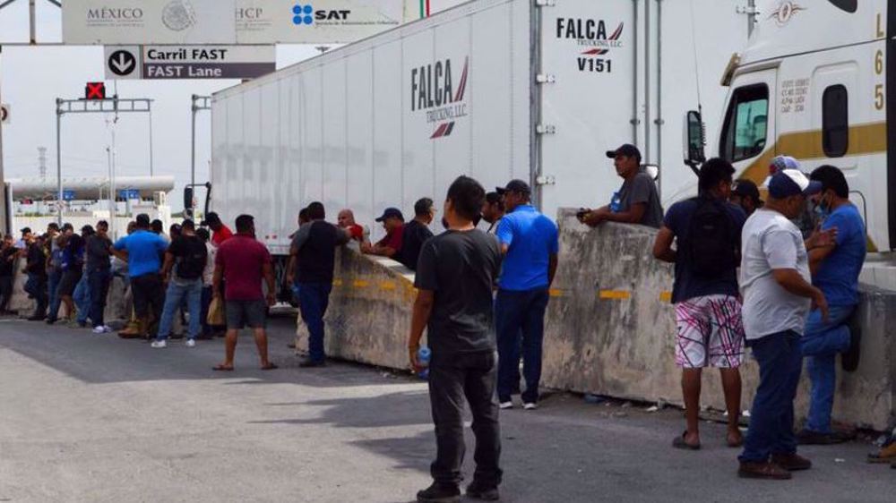 Mexican truckers block US border