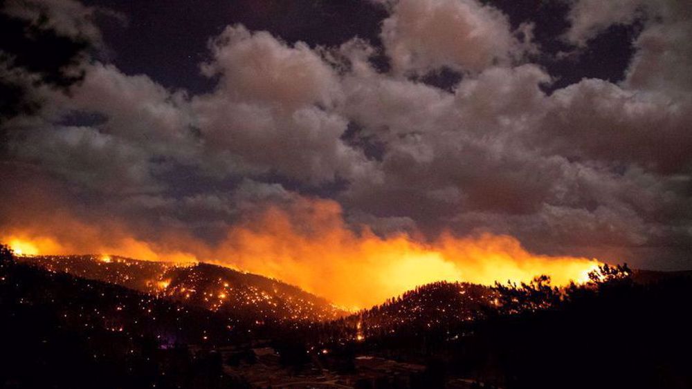 Two killed, hundreds of homes burned in New Mexico wildfire