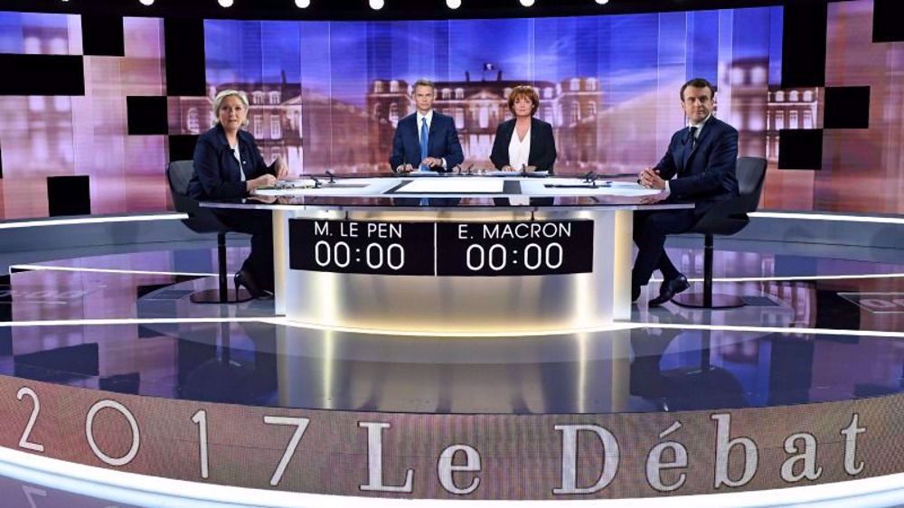 Macron, Le Pen clash on Russia, Muslim headscarf ban pledge in TV presidential debate