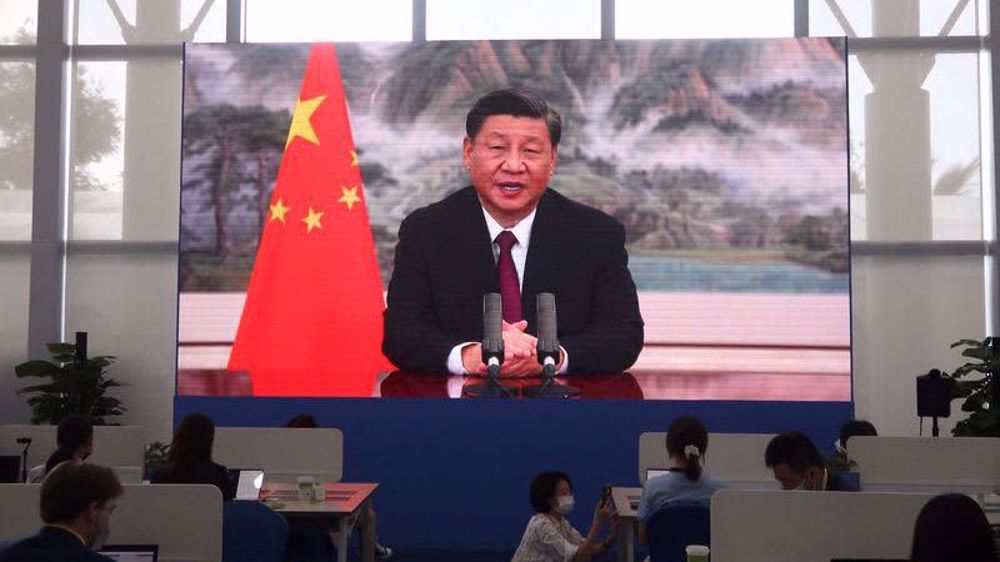 China's Xi slams sanctions, de-coupling