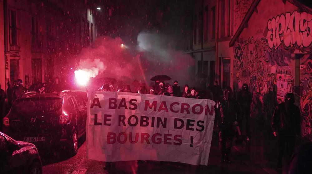 Macron's re-election sparks protests in divided France; police kill two 