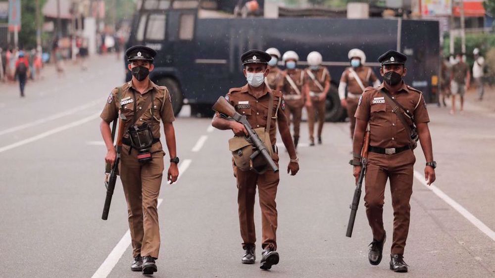 Sri Lanka unrest: Protesters defy curfew, police fire tear gas 