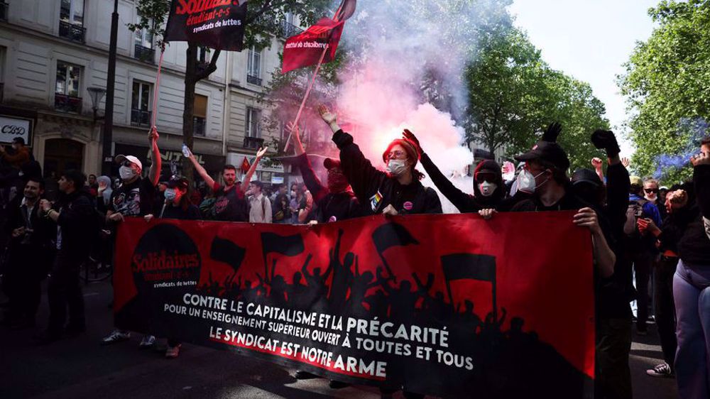 May Day marchers in France demand social justice, mount pressure on re-elected Macron