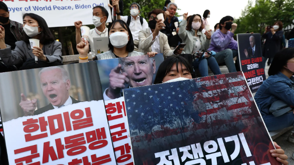 South Koreans protest Biden visit to Seoul amid heavy police presence 