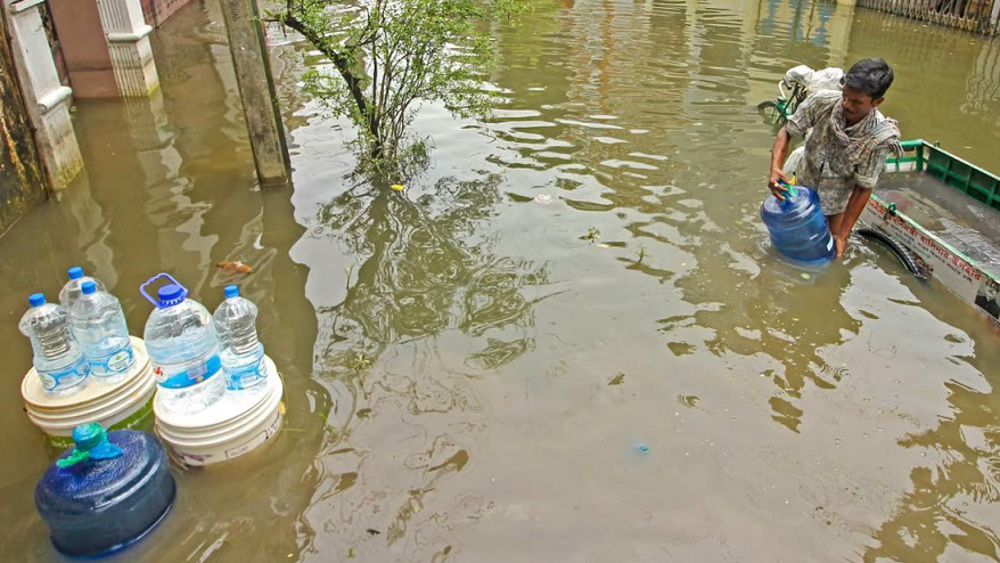 Millions stranded, dozens dead as deadly floods hit Bangladesh, India
