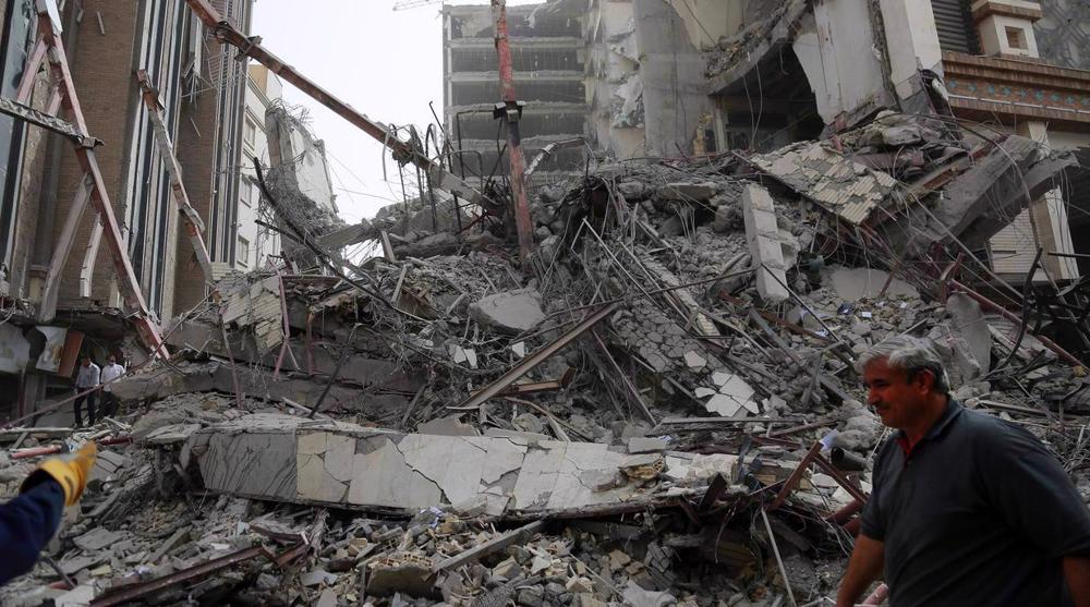 Death toll from building collapse in Iranian city rises to 14