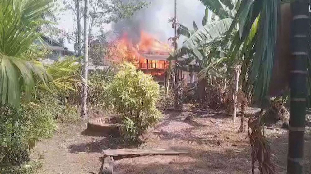 Village homes in flames as clashes continue in eastern Myanmar